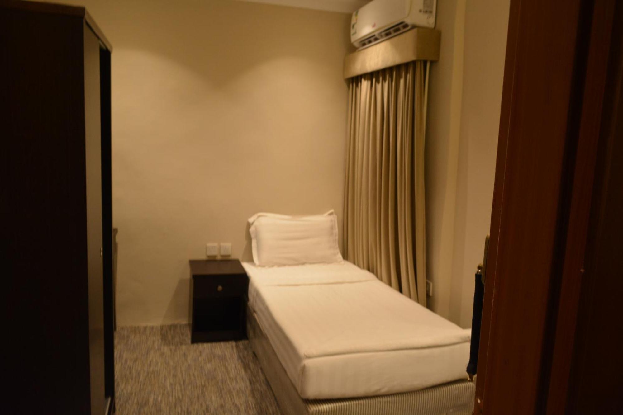 kinan al azizia hotel makkah location